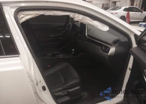 2021 Toyota C-Hr Limited z USA, uszkodzony, nr VIN JTNKHMBX4M1095662